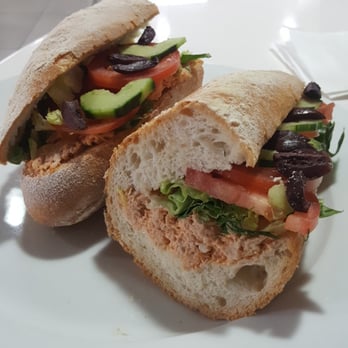 Flo Paris - Tuna niscoise sandwich with black olives, cucumbers, tomatoes and THAT BAGUETTE... so good - Bakeries Near Me - Houston, Texas