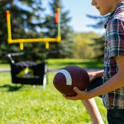 Moose & Maple Games - Engage in the ultimate hybrid of football and bean bag toss with QB54, a game that combines accuracy, teamwork, and a competitive edge.