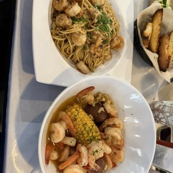 The Crab Shack - Garlic noodles with shrimp and peeled shrimp with corn and potatoes - Cajun/Creole Near Me - Cypress, California