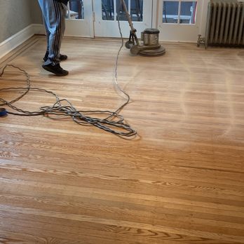 Paulie's Steamers - Paulie working that sander after the first coat was applied. - Carpet Cleaning Near Me Paulie's Steamers - Paulie working that sander after the first coat was applied. - Carpet Cleaning Near Me