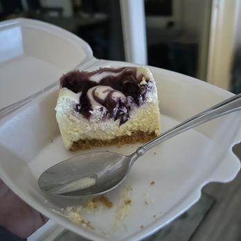 Apollo Pizza - Took home the most delicious ricotta cheesecake with blackberry swirl for dessert - Pizza Near Me - Apollo Beach, Florida