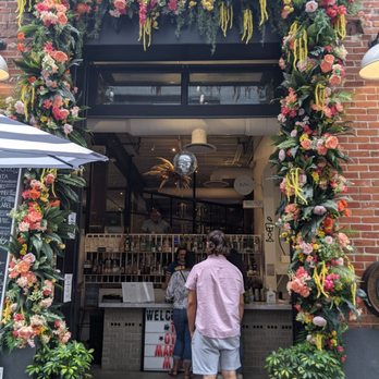 Brutø - Entrance. So pretty with the flowers - Tapas/Small Plates Near Me - Denver, Colorado Brutø - Entrance. So pretty with the flowers - Tapas/Small Plates Near Me - Denver, Colorado