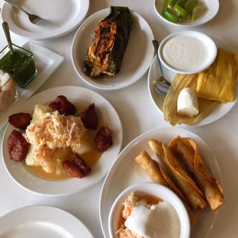 Madrono Restaurant - Chancho con Yuca, Nacatamal, Sweet Corn Island served w Cuajada y Crema, Tacos topped w/ cabbage y crema.. yes Ma'am! - Latin American Near Me - Miami, Florida Madrono Restaurant - Chancho con Yuca, Nacatamal, Sweet Corn Island served w Cuajada y Crema, Tacos topped w/ cabbage y crema.. yes Ma'am! - Latin American Near Me - Miami, Florida