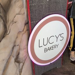 Lucy's sign at the corridor entrance to the courtyard. Lucy's sign at the corridor entrance to the courtyard.