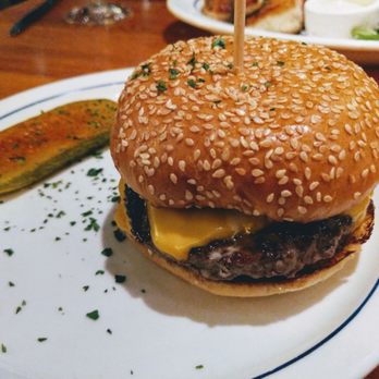 Hudson House - THE CHEESEBURGER - thin patties, American cheese, pickles, minced onion, Hudson sauce often imitated, never duplicated - American Near Me - Dallas, Texas