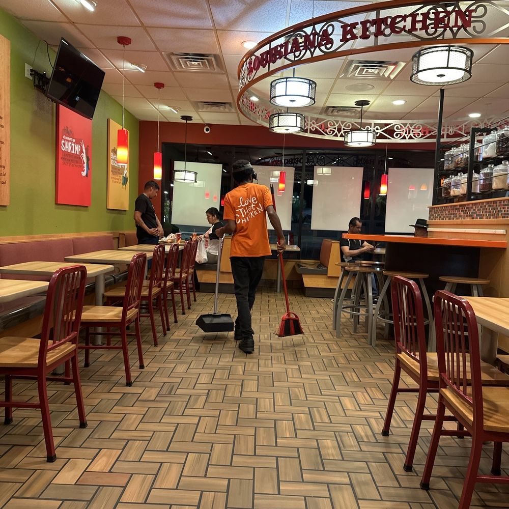 Elijah keeping the store clean while juggling customers. Elijah keeping the store clean while juggling customers.