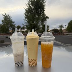 Coconut milk tea, mango smoothie, and passion fruit tea