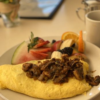 Katrina's Cafe - an omelet with a side of fruit - Breakfast & Brunch Near Me - Auburn, California Katrina's Cafe - an omelet with a side of fruit - Breakfast & Brunch Near Me - Auburn, California