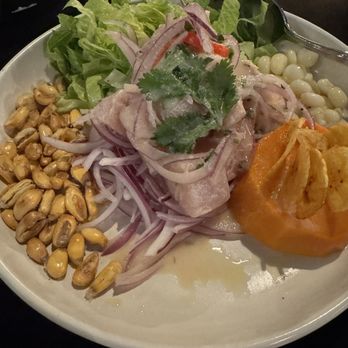 Paititi Peruvian Bistro - Ceviche. Chunks of fish in middle & you mix up so almost like salad. Bit bland - Peruvian Near Me - Sacramento, California