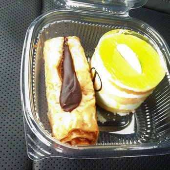 National Bakery - One was already consumed. Here are a rolled type of baklava (left) and a key lime tart (right). - Bakeries Near Me - Tarpon Springs, Florida National Bakery - One was already consumed. Here are a rolled type of baklava (left) and a key lime tart (right). - Bakeries Near Me - Tarpon Springs, Florida