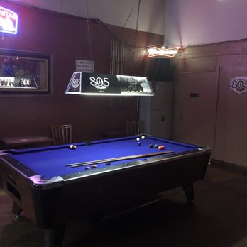 TJ's Tavern - a pool table and neon signs - Dive Bars Near Me - Vacaville, California