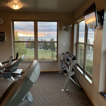 Surfside on Lake Superior - The common area gym space with views of the lake. - Hotels Near Me - Tofte, Minnesota