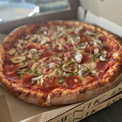 Jonesport Pizza Shop - The works! The pizza crust was great and had a few bubble which everyone fights over.