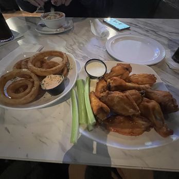 Corner Pub & Grill - Wings and onion rings. - Pizza Near Me - Canton, Michigan
