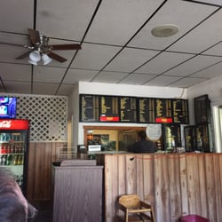 GMS Pizza - Order here, when someone shows up from working out back. Then they bring it to you. No beer.