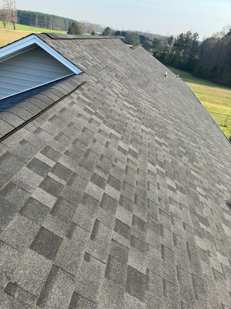 Slide of E. Thompson Roofing