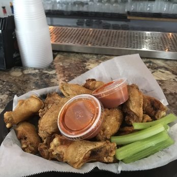 LOCAL Bar & Kitchen - 20 wings dry hot sauce in the side $18.50. Yum - Pubs Near Me - Gibbstown, New Jersey