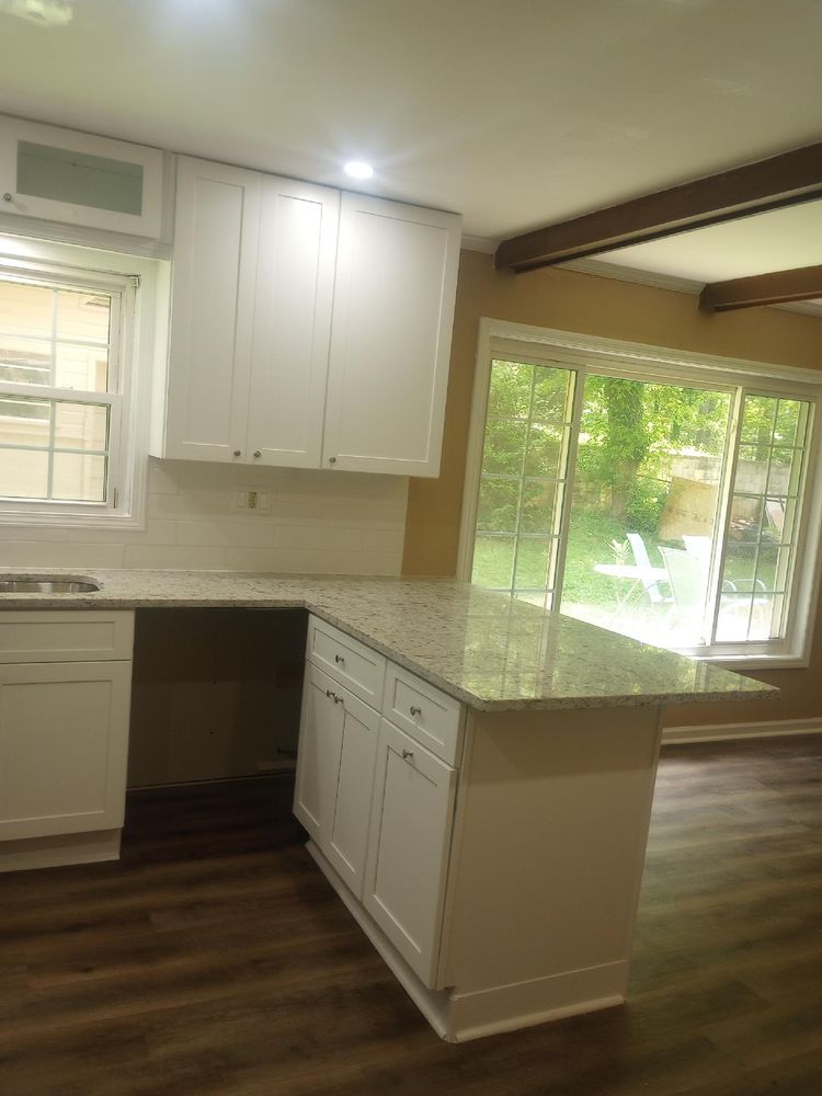 Slide of JS Roofing Group