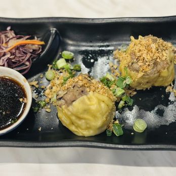 The Nine Heathrow Thai Grill & Kitchen - The dumpling came with 4, but we ate 2 before I took the pic - Thai Near Me - Heathrow, Florida The Nine Heathrow Thai Grill & Kitchen - The dumpling came with 4, but we ate 2 before I took the pic - Thai Near Me - Heathrow, Florida