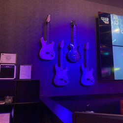 Rock N Roll Sushi - Guitars on the wall, cool, Roll Tide!