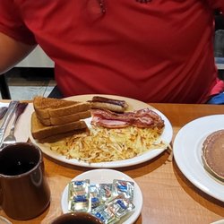 Cadillac Square Beer Garden - Sampler was 3 eggs, hashbrowns, grits, bacon, sausage links and ham. With a side of hotcakes. It had several options, ordered them all...