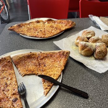 Power Pizzeria - a slice of pizza on a plate - Pizza Near Me - Miami, Florida Power Pizzeria - a slice of pizza on a plate - Pizza Near Me - Miami, Florida