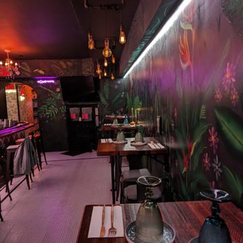 La Diaspora - High top seating and view of the dining area - Latin American Near Me - New York, New York La Diaspora - High top seating and view of the dining area - Latin American Near Me - New York, New York