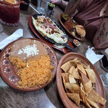 Tulum Mexican Kitchen - Homemade chips and the rice and beans that come with the Pastor tacos - Mexican Near Me - Manteca, California