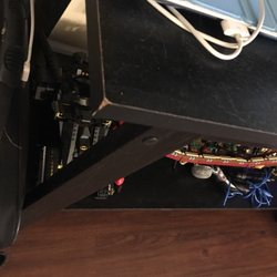 Ocean State Movers & Property Services - Brand new TV stand. Damaged.