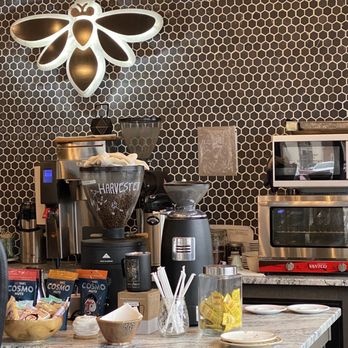 Honeybee Coffee - Bee themed backdrop at barista station. - Coffee & Tea Near Me - Sevierville, Tennessee