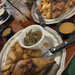 Shared 2" pork chop with green beans and potatoes. Great value for 2 people.