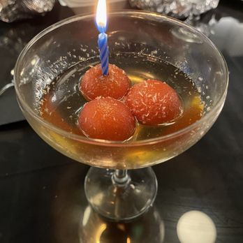 Zen Curry and Grill - Found out it was birthday and brought me out this delightful dish, which is a soft donut ball in rose water. - Indian Near Me - Temecula, California Zen Curry and Grill - Found out it was birthday and brought me out this delightful dish, which is a soft donut ball in rose water. - Indian Near Me - Temecula, California