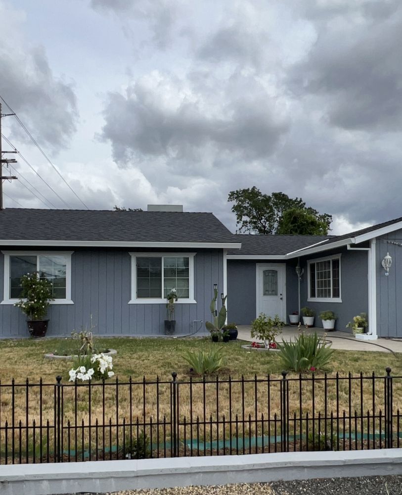 Slide of New Era Roofing