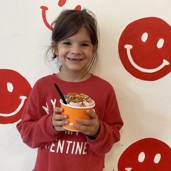 Frozo - a little girl holding a cup of ice cream - Ice Cream & Frozen Yogurt Near Me - Flowery Branch, Georgia Frozo - a little girl holding a cup of ice cream - Ice Cream & Frozen Yogurt Near Me - Flowery Branch, Georgia