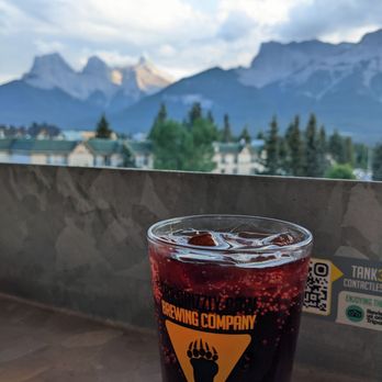 Tank310 - The view with a Black Cherry Cola - Brewpubs Near Me - Canmore, Alberta