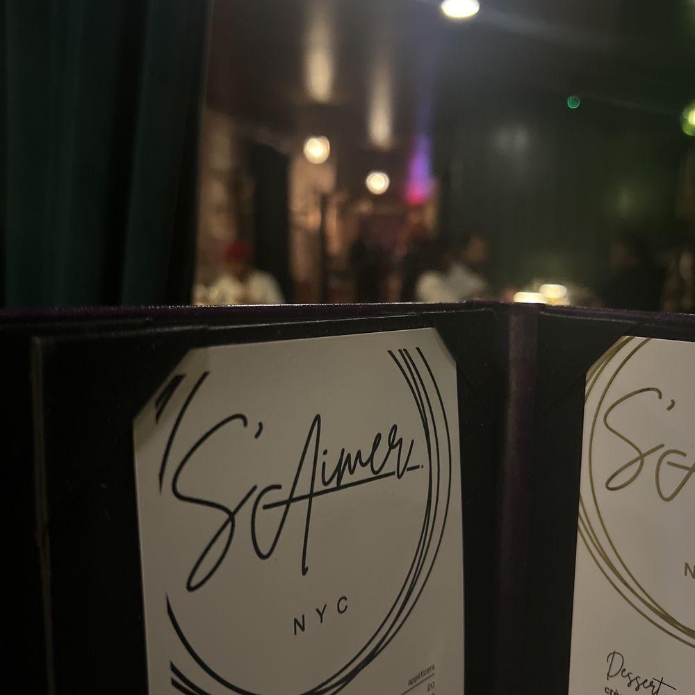 S'Aimer - two menus on a table - Lounges Near Me - New York, New York S'Aimer - two menus on a table - Lounges Near Me - New York, New York