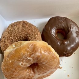 Cinnamon sugar donut, chocolate glazed donut, regular glazed donut