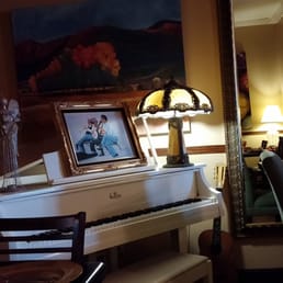 a piano in a dining room