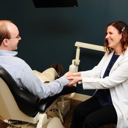 Davies Dental - Dr. Davies meeting with a patient.