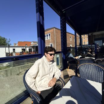 Muddy Waters Cafe - My son enjoying the porch - Coffee & Tea Near Me - New London, Connecticut Muddy Waters Cafe - My son enjoying the porch - Coffee & Tea Near Me - New London, Connecticut