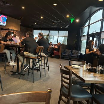 The Crain Lounge & Kitchen - Other than the bar, there's maybe 1-2 dozen tables, 2 large booths and scattered tables and bar tables. - Lounges Near Me - Oklahoma City, Oklahoma