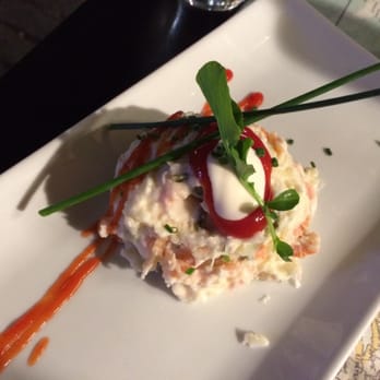 La Azotea - Potato salad with smoked salmon, capers, and ketchup. Sounds bizarre but tastes delicious! - Tapas Bars Near Me - Seville, SE