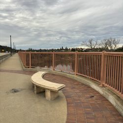 Lake Natoma Waterfront Access Trail - Lake Natoma Crossing Bridge. It has benches where you can stop and sit a spell with a view of the American River.