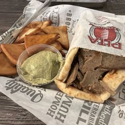 Gyro, pita chips and cilantro hummus. Gyro, pita chips and cilantro hummus.