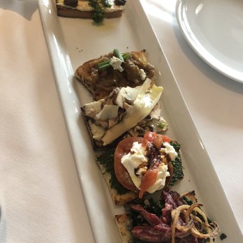 Fig & Olive - The bruschetta is a must try. This had sweet and salty prices to try - French Near Me - Houston, Texas