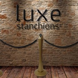 Stanchion Masters - Antique gold brass VIP stanchions and rope post barriers for nightclubs, hotels and casinos