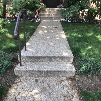 Turf Center Lawns - a walkway leading to a front door - Landscaping Near Me - Spencerville, Maryland Turf Center Lawns - a walkway leading to a front door - Landscaping Near Me - Spencerville, Maryland