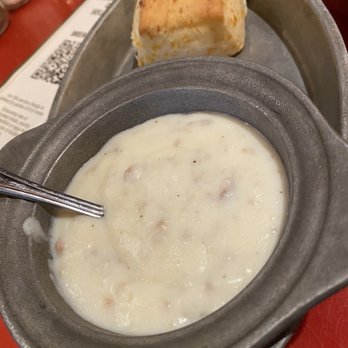 Whispering Canyon Cafe - The buttermilk cheddar biscuit & sausage gravy Part of the Carnivore (all-you-can-eat) - Barbeque Near Me - Lake Buena Vista, Florida Whispering Canyon Cafe - The buttermilk cheddar biscuit & sausage gravy Part of the Carnivore (all-you-can-eat) - Barbeque Near Me - Lake Buena Vista, Florida