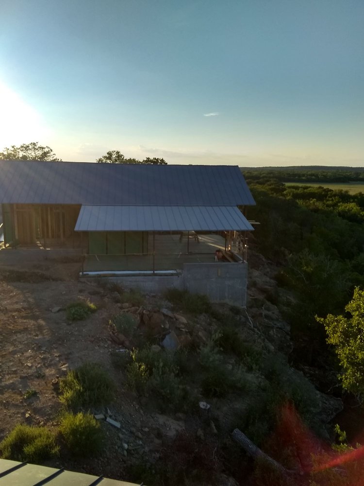 Slide of Camacho Roofing Construction