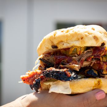 Porter’s - The Pit House Stack: towering flavor in every bite. Pulled pork, brisket, coleslaw, pickles, and bbq sauce. - Desserts Near Me - Nebraska City, Nebraska Porter’s - The Pit House Stack: towering flavor in every bite. Pulled pork, brisket, coleslaw, pickles, and bbq sauce. - Desserts Near Me - Nebraska City, Nebraska